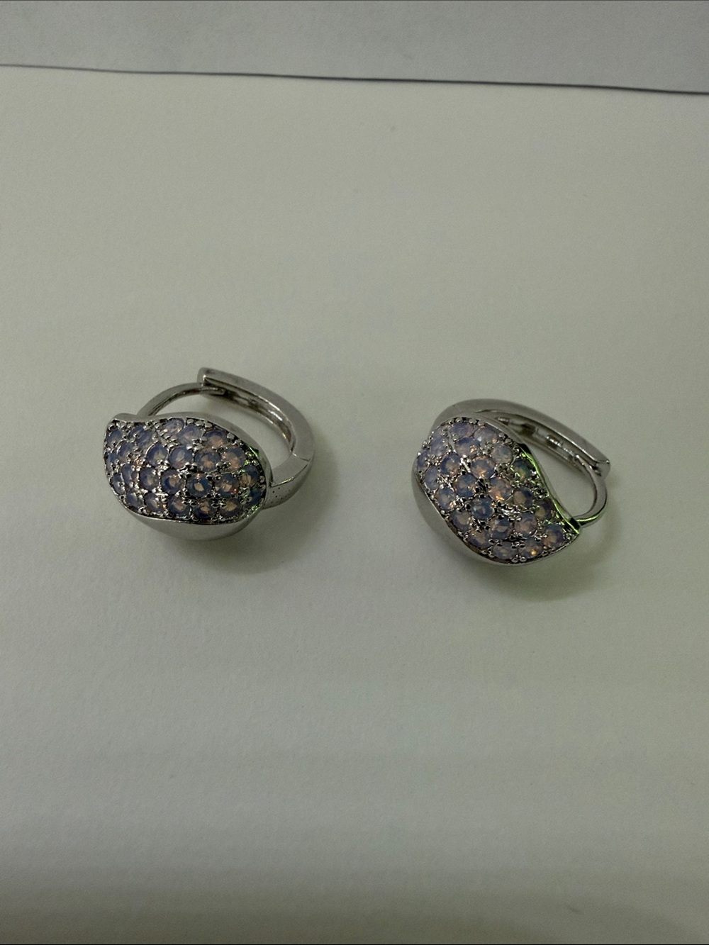 Silver Teardrop Hoop Earrings with Blue Accents stones